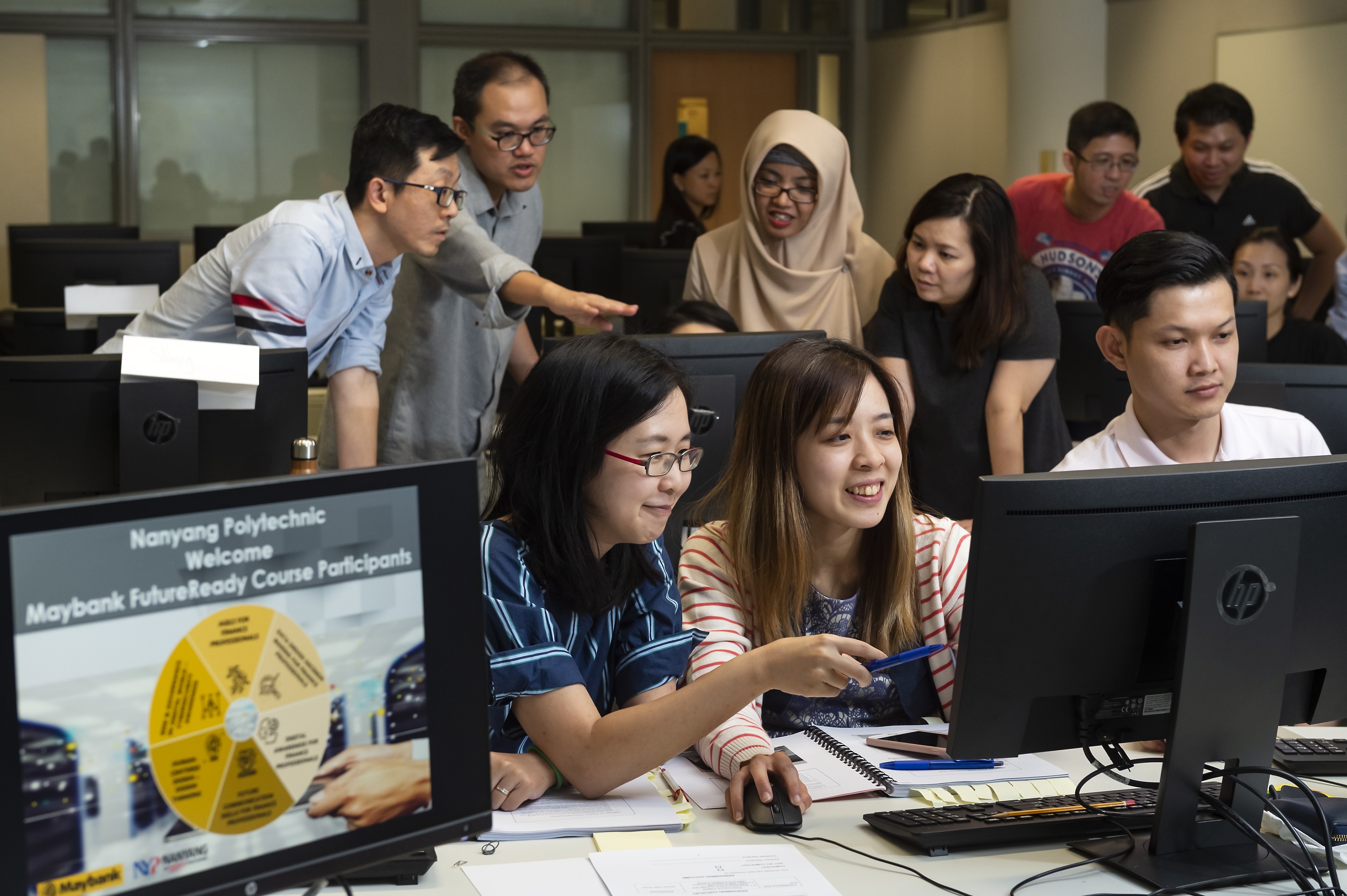 Maybank employees begin their course in a Nanyang Polytechnic computer lab